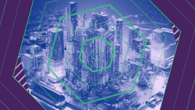 Futuristic cityscape with tall skyscrapers, highlighted by green hexagonal patterns.