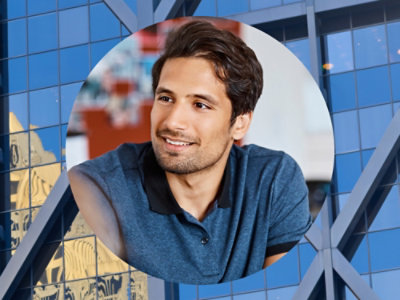 A man wearing a blue shirt.