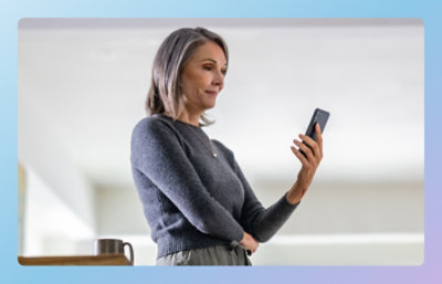 A woman holding a phone.