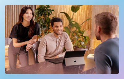A group of people sitting at a table.