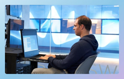 A man sitting at a computer.