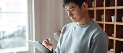 A person wearing a grey shirt.