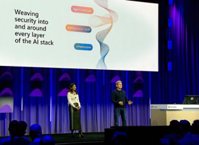 Two peoples on the stage hosting the show.