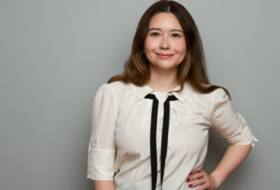 A woman with her hand on her hip.