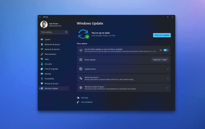 Inställningsskärm som visar Windows Update mot en tonad blå bakgrund