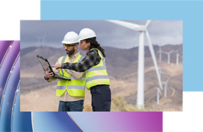 En person og en anden person iført sikkerhedsveste og hjelme