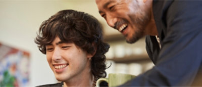 A group of men smiling
