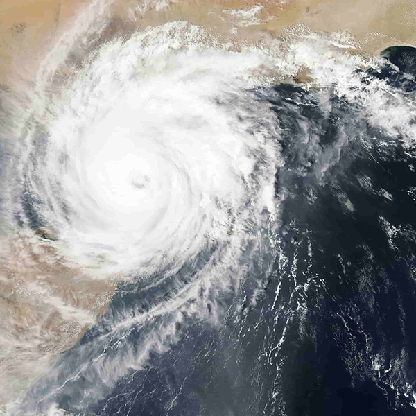 Satellite image of a swirling, symmetrical hurricane with a clear eye at the center from the Microsoft Planetary Computer. Satellite image of a swirling, symmetrical hurricane with a clear eye at the center from the Microsoft Planetary Computer.